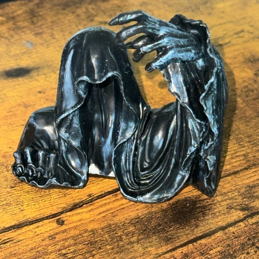 Grim reaper spooky figure